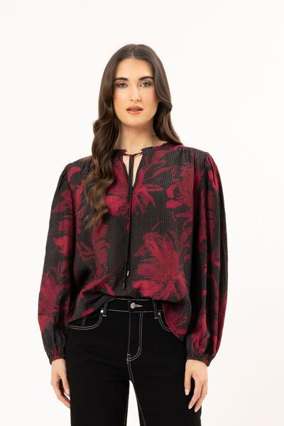Merlot floral print

Soft ribbed texture

Round neckline with tie keyhole detail

Elasticated cuffs

Relaxed fit

Lightweight, floaty feel

Fabric
86% Viscose, 14% Nylon