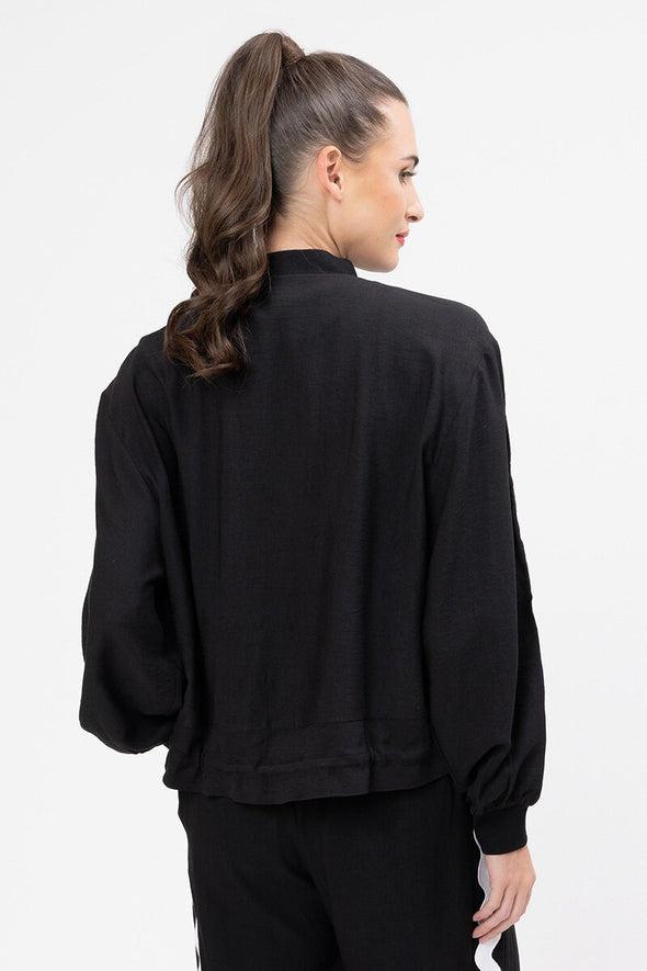65% Viscose, 35% Nylon

Zip front closure for effortless wear

Ric rac trim down sleeves and pocket edges

Crew neckline with ribbed cuffs for a neat finish

Functional side pockets

Drawcord hem for adjustable styling

Unlined, standard fit for a relaxed style
