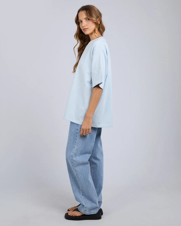 The Silent Luxe Tee redefines elevated basics with its soft heavyweight jersey and structured oversized fit. Detailed with subtle branded embroidery, it seamlessly transitions from casual outings to professional settings, offering refined comfort and versatile style.