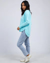 Add a pop of colour to your casual wardrobe with the Foxwood Simplified Crew in Light Blue. This vibrant crew is the ultimate layering piece, designed to bring both comfort and style to your everyday outfits. Featuring a relaxed round neckline, a flattering hi-lo hemline with side splits, and trendy raw edge detailing, this crew offers an effortlessly cool vibe. The embroidered Foxwood logo on the chest adds a touch of signature style, making this a go-to piece for any casual look.

Made from 100% cotton, i