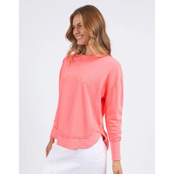 Add a BRIGHT pop of colour to your casual wardrobe with the Foxwood Simplified Crew in Neon Pink. This vibrant crew is the ultimate layering piece, designed to bring both comfort and style to your everyday outfits. Featuring a relaxed round neckline, a flattering hi-lo hemline with side splits, and trendy raw edge detailing, this crew offers an effortlessly cool vibe. The embroidered Foxwood logo on the chest adds a touch of signature style, making this a go-to piece for any casual look.

 100% cotton