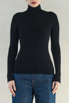 Experience effortless elegance with the Isla Top. Made from 100% super soft merino wool, this wardrobe staple offers lightweight warmth in colder weather and natural breathability for comfort in milder temperatures. Perfect for layering and suitable for any occasion. Elevate your style with the Isla Top.