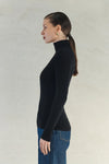 Experience effortless elegance with the Isla Top. Made from 100% super soft merino wool, this wardrobe staple offers lightweight warmth in colder weather and natural breathability for comfort in milder temperatures. Perfect for layering and suitable for any occasion. Elevate your style with the Isla Top.