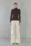 Experience effortless elegance with the Isla Top. Made from 100% super soft merino wool, this wardrobe staple offers lightweight warmth in colder weather and natural breathability for comfort in milder temperatures. Perfect for layering and suitable for any occasion. Elevate your style with the Isla Top.