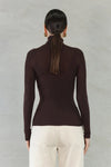 Experience effortless elegance with the Isla Top. Made from 100% super soft merino wool, this wardrobe staple offers lightweight warmth in colder weather and natural breathability for comfort in milder temperatures. Perfect for layering and suitable for any occasion. Elevate your style with the Isla Top.