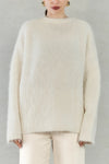 Ivory Colour
78% Alpaca, 19% Nylon, 3% Spandex
Brushed effect
Crew neck
Long sleeves