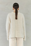 Ivory Colour
78% Alpaca, 19% Nylon, 3% Spandex
Brushed effect
Crew neck
Long sleeves