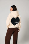 Elevate your off-duty style with the SŚAINT Butter Hoodie – where comfort meets bold design. Crafted from a soft and durable 50% cotton, 50% polyester blend, this fleece-lined hoodie is the perfect throw-on for cooler days.