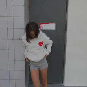 Elevate your off-duty style with the SŚAINT Grey Heart Hoodie – where comfort meets bold design. Crafted from a soft and durable 50% cotton, 50% polyester blend, this fleece-lined hoodie is the perfect throw-on for cooler days.
