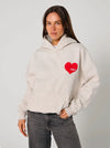 Elevate your off-duty style with the SŚAINT Grey Heart Hoodie – where comfort meets bold design. Crafted from a soft and durable 50% cotton, 50% polyester blend, this fleece-lined hoodie is the perfect throw-on for cooler days.