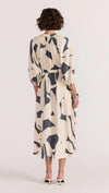 Introducing the Aura Midi Dress - the perfect combination of style and ease. Cut from a lightweight fabric in our exclusive abstract print, this dress effortlessly transitions from casual days to special occasions. With a button-through front, gathered waist, and soft sleeve volume, it's the epitome of throw-on-and-wow.