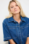 100% cotton for natural softness and breathability

Relaxed short sleeves for all-day comfort

Oversized chest pockets with utilitarian detail

Button front for versatile layering and styling