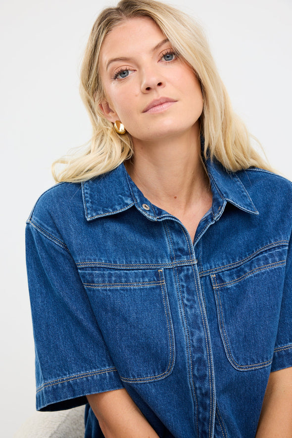 100% cotton for natural softness and breathability

Relaxed short sleeves for all-day comfort

Oversized chest pockets with utilitarian detail

Button front for versatile layering and styling