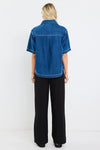 100% cotton for natural softness and breathability

Relaxed short sleeves for all-day comfort

Oversized chest pockets with utilitarian detail

Button front for versatile layering and styling