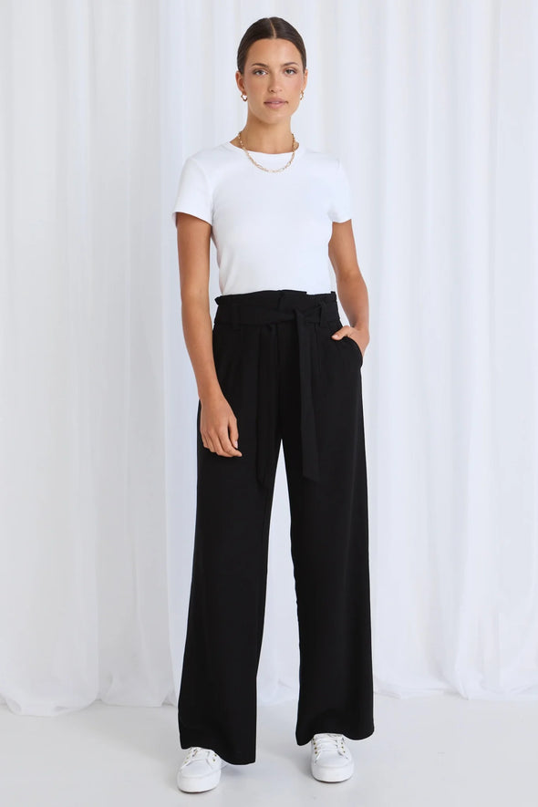 Indulge in the luxurious and timeless style of our Sydney High Waisted Pants. With their classic design, these pants are a versatile addition to any wardrobe. Dress them up or down for any occasion, and elevate your look to new levels of sophistication. A must-have for any fashion-forward individual.
