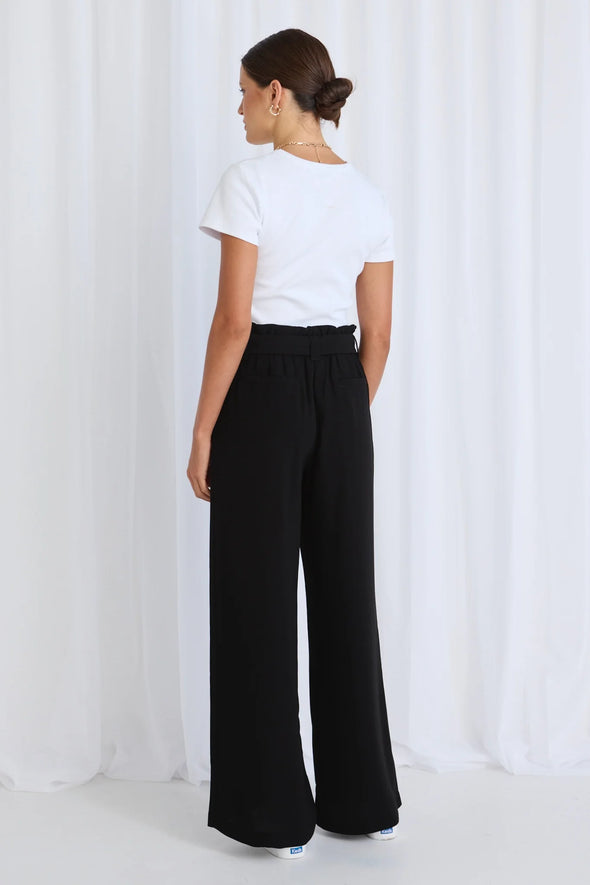 Indulge in the luxurious and timeless style of our Sydney High Waisted Pants. With their classic design, these pants are a versatile addition to any wardrobe. Dress them up or down for any occasion, and elevate your look to new levels of sophistication. A must-have for any fashion-forward individual.
