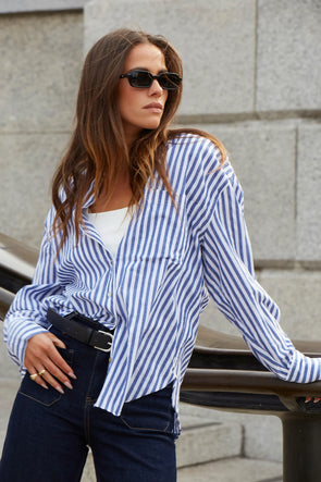 Discover the You Got This Shirt from Stories Be Told – an oversized cotton poplin shirt designed for effortless style, comfort, and versatile everyday wear.