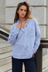 Discover the You Got This Shirt from Stories Be Told – an oversized cotton poplin shirt designed for effortless style, comfort, and versatile everyday wear.