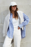 Discover the You Got This Shirt from Stories Be Told – an oversized cotton poplin shirt designed for effortless style, comfort, and versatile everyday wear.