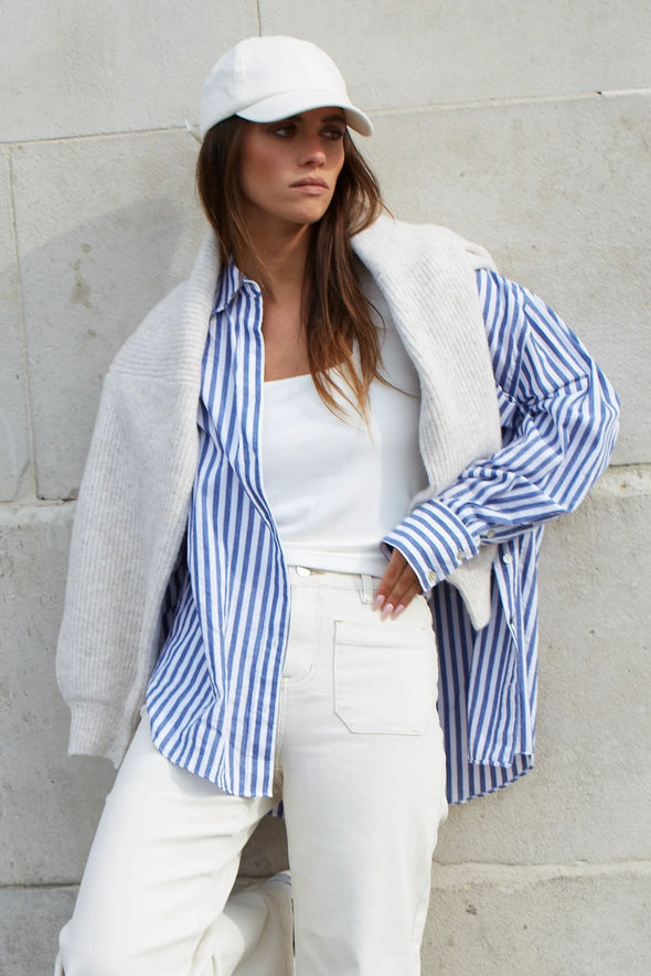 Discover the You Got This Shirt from Stories Be Told – an oversized cotton poplin shirt designed for effortless style, comfort, and versatile everyday wear.