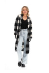 We are loving on this long line Black and White Check cardigan from Charlo! With the cutiest check and a snuggly feel who wouldnt want one of these for their wardrobe. Just realised and we cannot get anymore. Standard sizing , stick to your normal size&nbsp;
