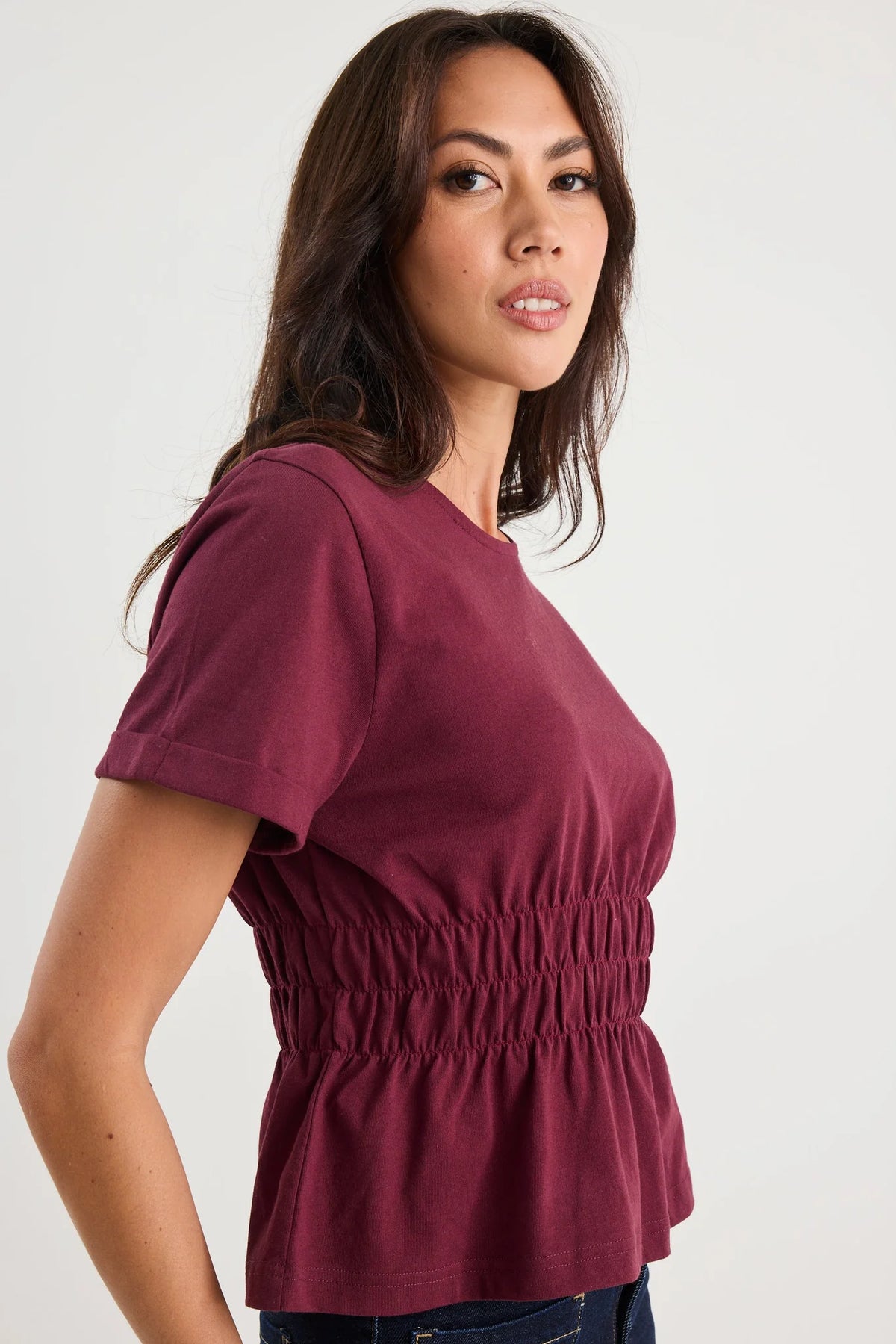 The Svelte Tee elevates the classic cotton essential with thoughtful design details. Crafted from breathable 100% cotton, this piece features a gently shirred waist that creates a flattering silhouette, paired with a softly flared hem for movement and grace. Finished with cuffed short sleeves and a refined crew neckline, it strikes the perfect balance between casual comfort and understated elegance. Versatile enough to pair with tailored trousers, flowing skirts, or your favourite denim, the Svelte Tee beco