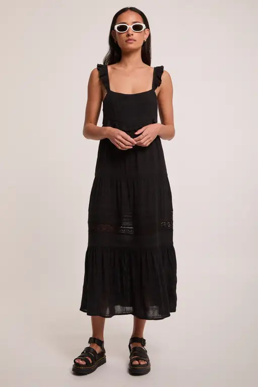 Get ready to make a classy statement at any fancy event this summer with the Pit Viper Dress from Volcom! This elegant midi-length dress features a super light material and charming frill details that will have you feeling like a true marvel. Perfect for any summer party, this dress is a must-have for your wardrobe.