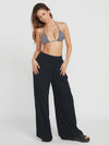 Soak up some sun in these silky smooth beach pants. With a wide leg fit and elasticized waistband, comfort is key. The 100% viscose crinkle gauze fabric is perfect for a breezy, laid-back look. And with convenient slash pockets, you'll have everything you need for a day at the beach. Featured in black. No need to pack anything else!