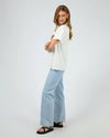 Get ready for some wanderlust with the Wanderlust Oversized Tee. Its distressed print adds a vintage touch and pairs perfectly with your favorite denim for a relaxed, effortless look. In a vintage white giving the print that worn edge. This soft tee is sure to be your go-to for laid-back days.

Oversized fit
Front print
Distressed graphics