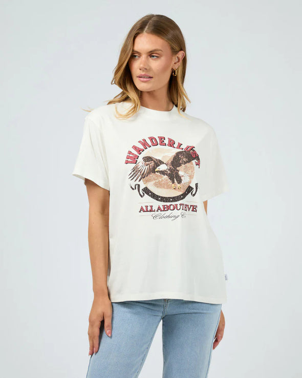 Get ready for some wanderlust with the Wanderlust Oversized Tee. Its distressed print adds a vintage touch and pairs perfectly with your favorite denim for a relaxed, effortless look. In a vintage white giving the print that worn edge. This soft tee is sure to be your go-to for laid-back days.

Oversized fit
Front print
Distressed graphics