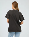 Get ready for some wanderlust with the Wanderlust Oversized Tee. Its distressed print adds a vintage touch and pairs perfectly with your favorite denim for a relaxed, effortless look. In a vintage washed black giving the print that worn edge. This soft tee is sure to be your go-to for laid-back days.

Oversized fit
Front print
Distressed graphics