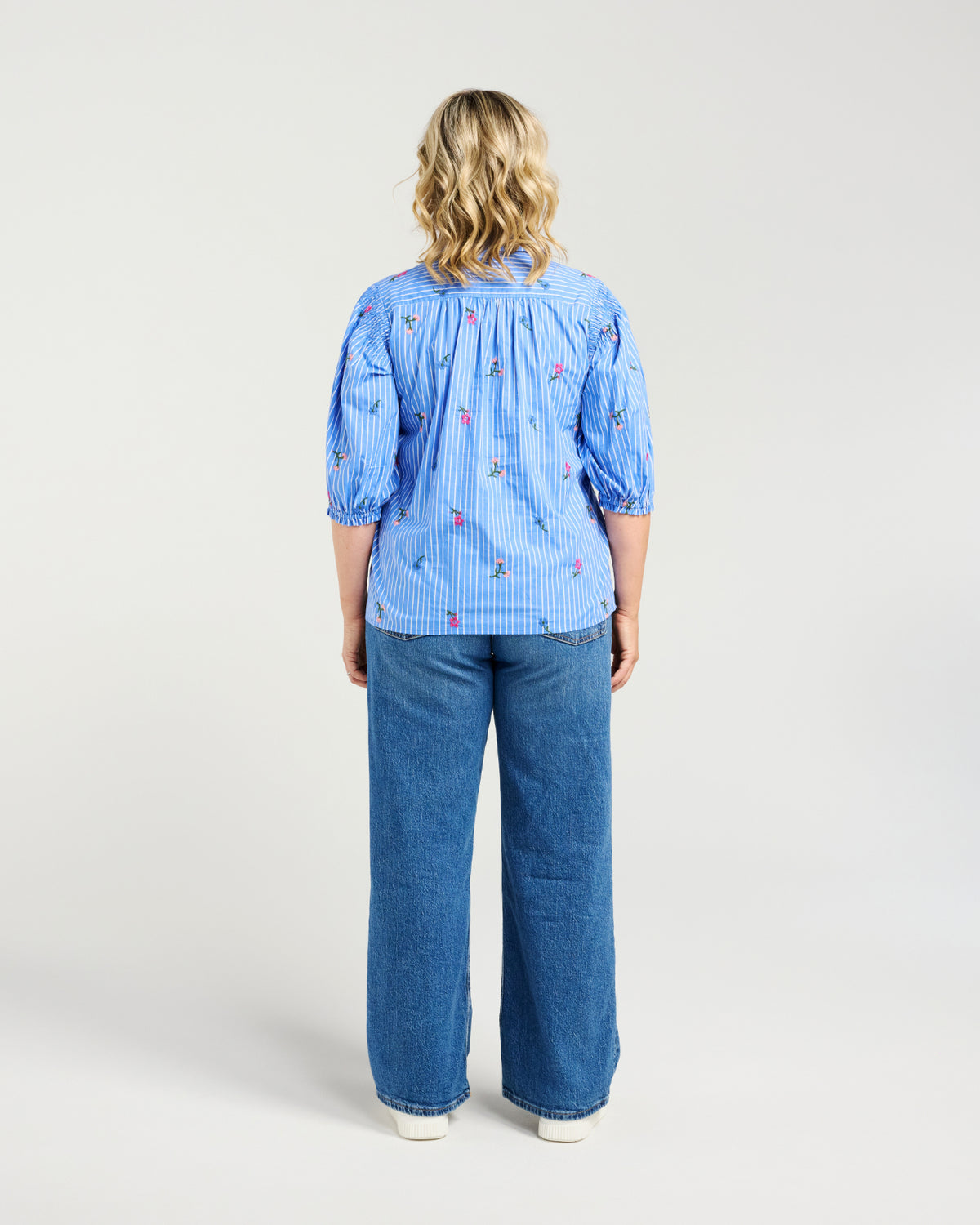 Blue and white stripe
Embroidered floral detailing
Elasticated sleeve detail
Relaxed, flattering fit
Lightweight and breathable
100% Cotton