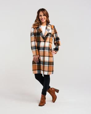 Add a pop of color to your winter wardrobe with our knee-length wool-blend coat! Its classic, elegant style is elevated by a striking orange and black plaid fabric. Perfect for the fashion-forward who still appreciate timeless sophistication.&nbsp;