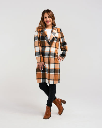 Add a pop of color to your winter wardrobe with our knee-length wool-blend coat! Its classic, elegant style is elevated by a striking orange and black plaid fabric. Perfect for the fashion-forward who still appreciate timeless sophistication.&nbsp;