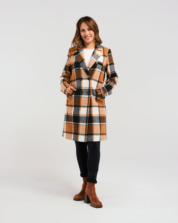 Add a pop of color to your winter wardrobe with our knee-length wool-blend coat! Its classic, elegant style is elevated by a striking orange and black plaid fabric. Perfect for the fashion-forward who still appreciate timeless sophistication.&nbsp;