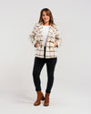 Stay stylish and warm all season in our effortlessly chic plaid coat. Made with soft fabric and shell buttons, this jacket also features convenient pockets. A must-have for any wardrobe!