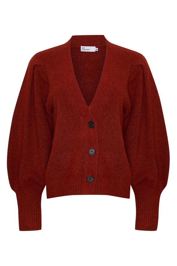 a deep v-neck, soft blouson sleeve and cropped length ensures the wander is both chic yet casual. wear this versatile knit alone as a fashion statement, or as a layering piece between seasons. see product details below. Colour Clay, a earthy red