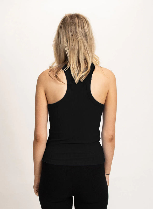 The Limit singlet has no limit! Easily wear it with anything. Features a crew neckline and rib fabric.