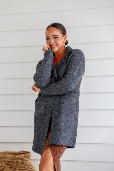 The Coatigan you have all been waiting for.&nbsp; Wool blend long line coatigan with pockets! we love a pocket. With a well designed collar to add extra elegance to this beautiful garment. Comes in both Latte and Charcoal and its going to be so hard to choose, you probably need both.