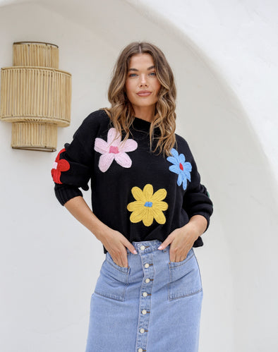 The Kartel Daisy Embroidery knit showcases a beautiful daisy print on the front and sleeves, with a round neck and ribbed cuffs. Crafted from a blend of acrylic and wool,35% wool infact,&nbsp; pair it with high-waisted jeans , pants or a denim skirt with ankle boots for a cozy yet stylish look.
