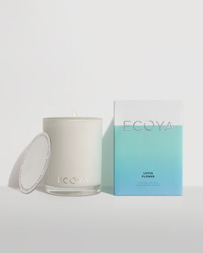 Natural soy wax is blended with our signature fragrances and is poured into a contemporary and refined glass jar, providing a delicately scented burn time of up to 80 hours. With a decadent silver lid and presented in a beautifully designed box, the Madison Candle is the perfect gift for any occasion. 400g soy candle.