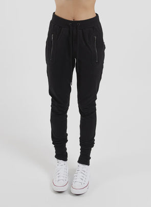 Our much-loved slim leg, drop crotch trackies. The Escape Trackie features black metal zip detailing upfront and a patch pocket on left leg.