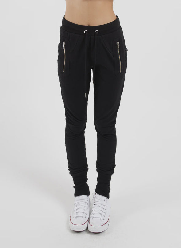 Our much-loved slim leg trackies in the Coordinates print. The Escape Trackie features silver metal zip detailing upfront and a patch pocket on the left leg.Finished off with wide rib cuffs and ribbed waistband pulled together with drawstring ties. Wear them your way sitting on the hip or high on the waist.