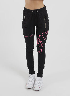 Our much-loved slim leg trackies in the Coordinates print. The Escape Trackie features silver metal zip detailing upfront and a patch pocket on the left leg.Finished off with wide rib cuffs and ribbed waistband pulled together with drawstring ties. Wear them your way sitting on the hip or high on the waist.
